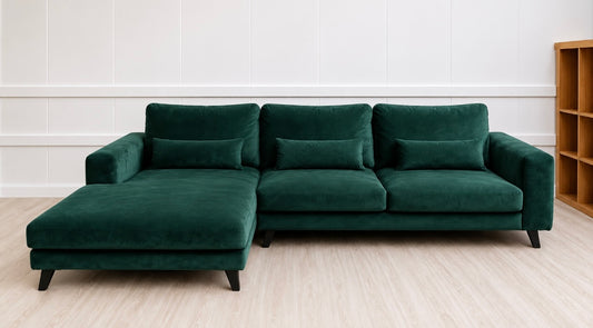 Grön sammet soffa
